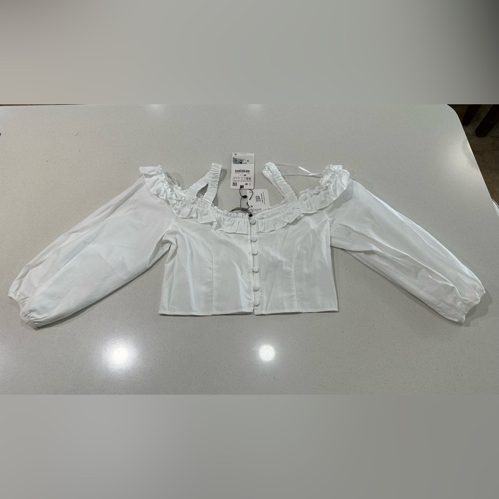 Zara White Ruffled Off-Shoulder Blouse.